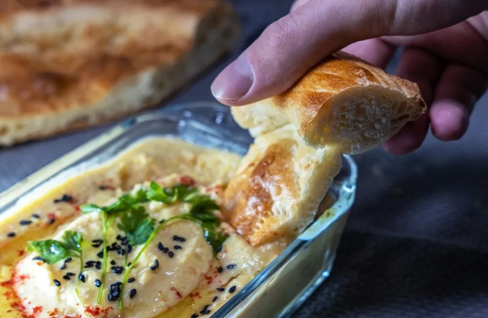 bread dipped in tahini